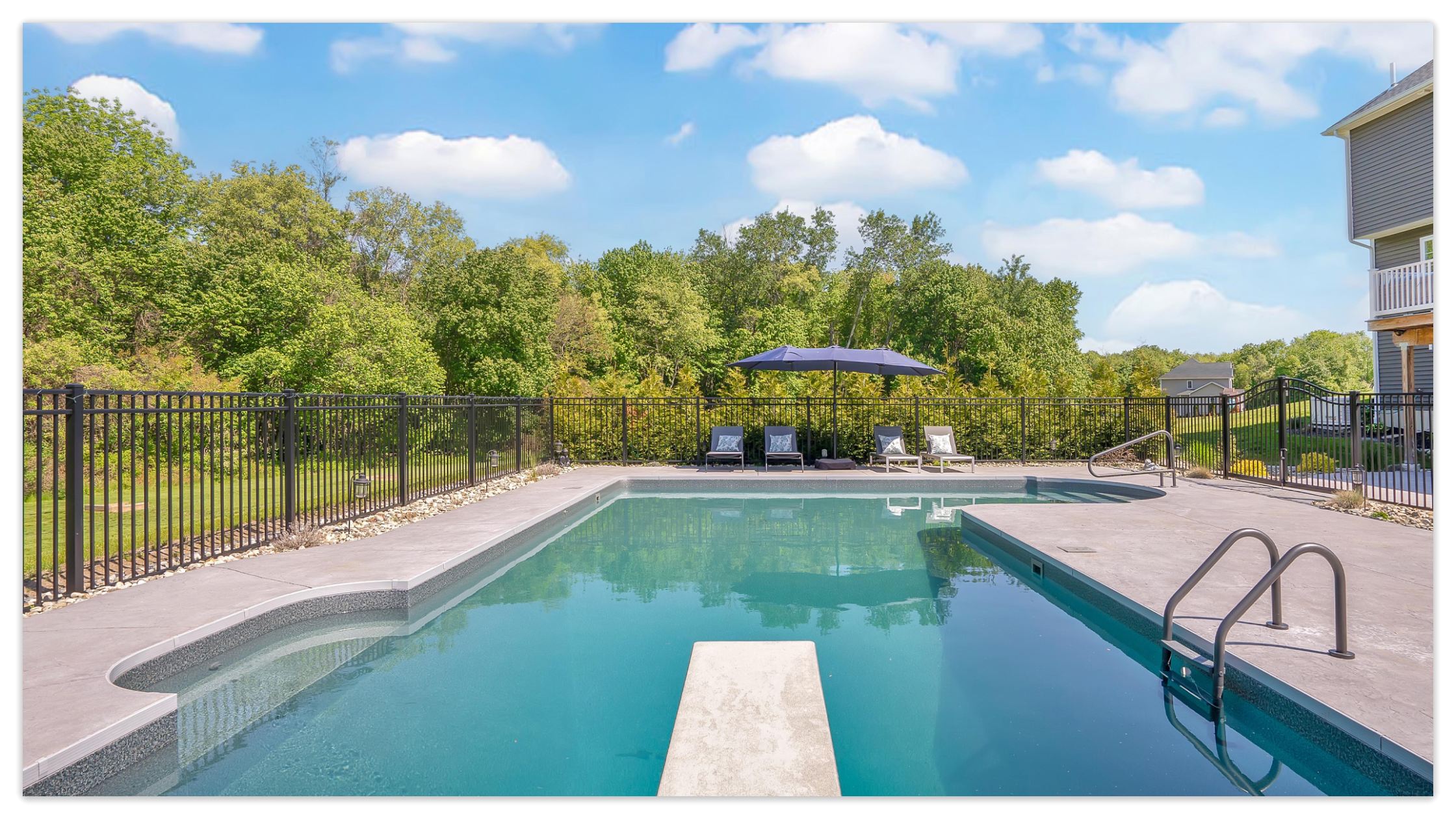 A beautiful backyard inground swimming pool