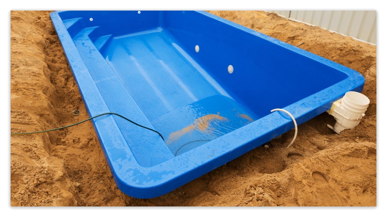 Installing a fiberglass pool.