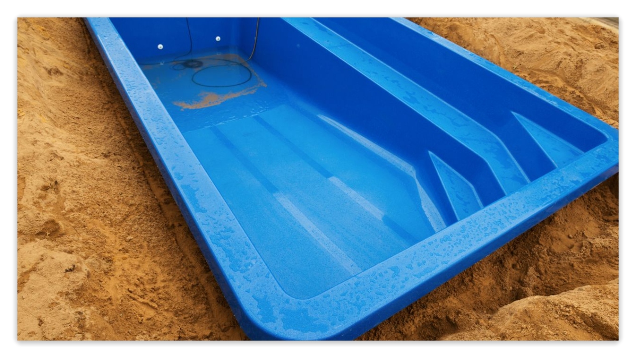Show a fiberglass pool's size and shape.