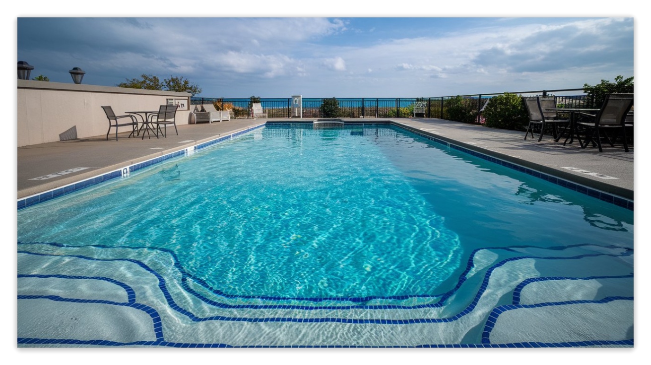 A standard swimming pool with crystal clear water
