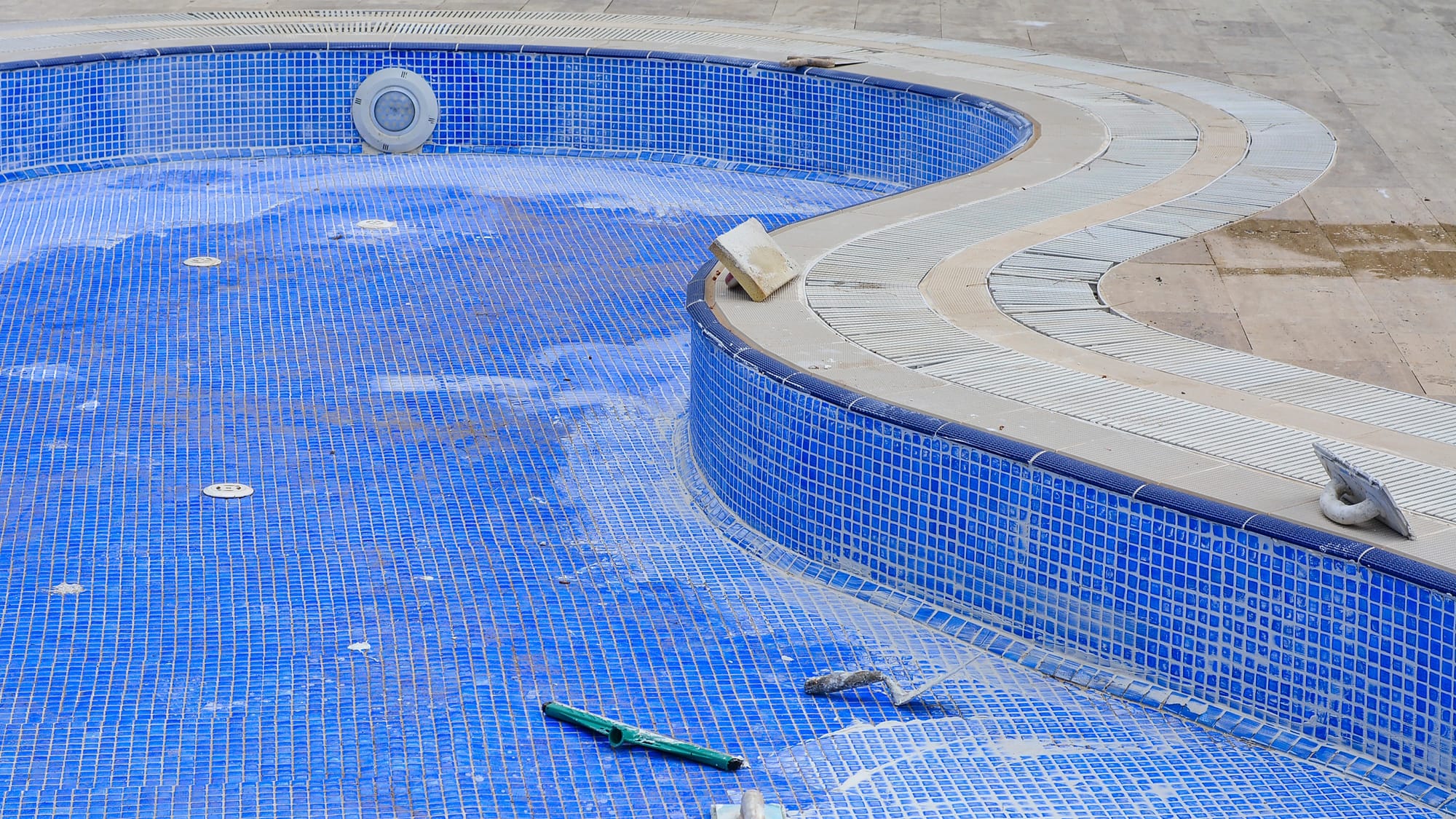 A swimming pool in need of renovation