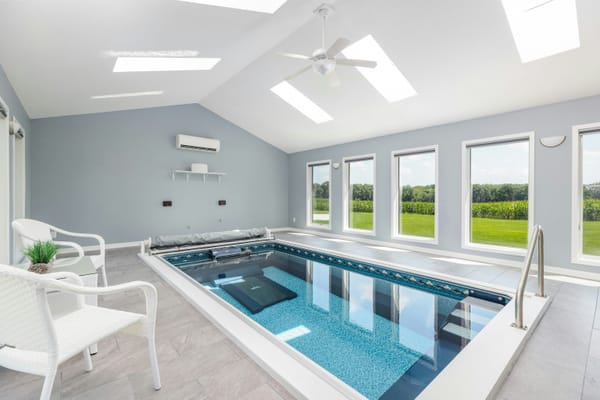 A neat indoor pool allowing swimming during winter.